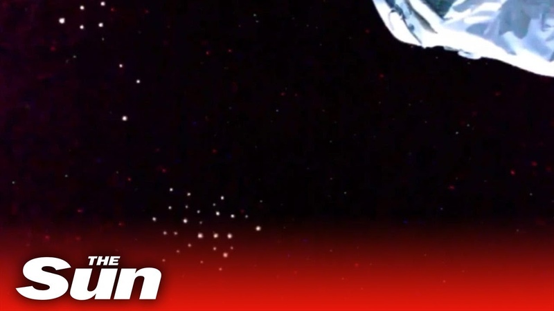 Mysterious lights spotted drifting past ISS on Nasa live feed spark claims of alien