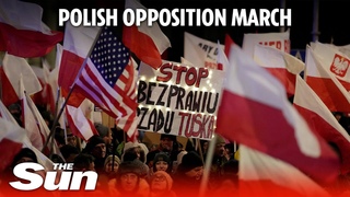 Thousands march through Warsaw in protest against arrest of ex-ministers