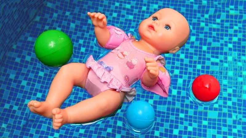 Barbie and Baby doll in a pool. Clown funny